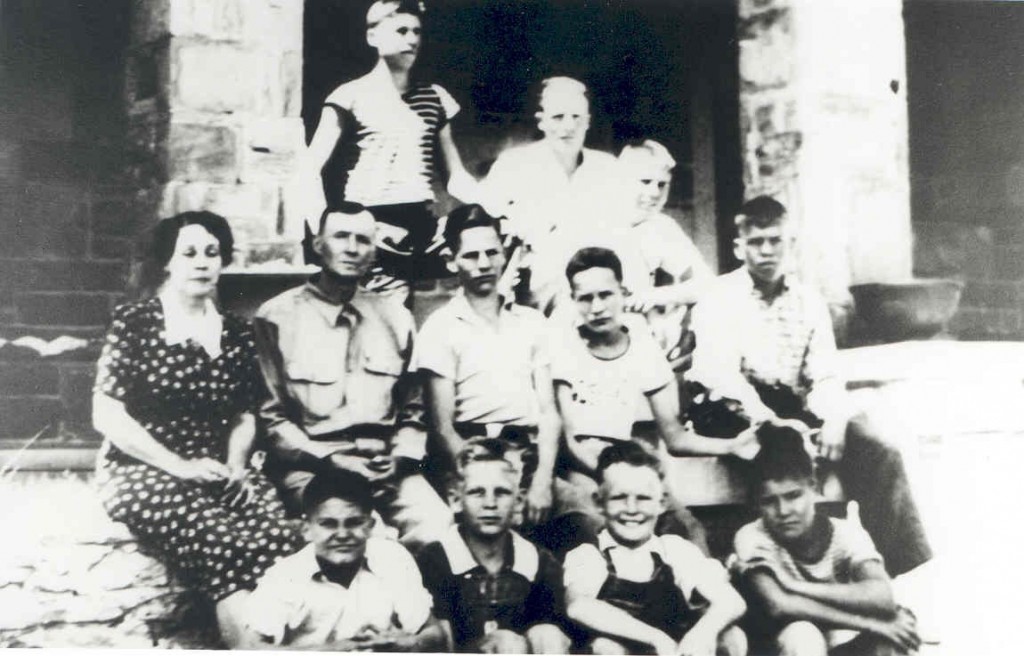 Photo of the first 9 boys to live at Boys Ranch and their houseparents